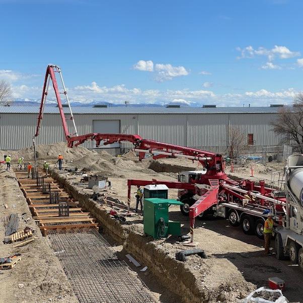 Concrete work with a red pump truck