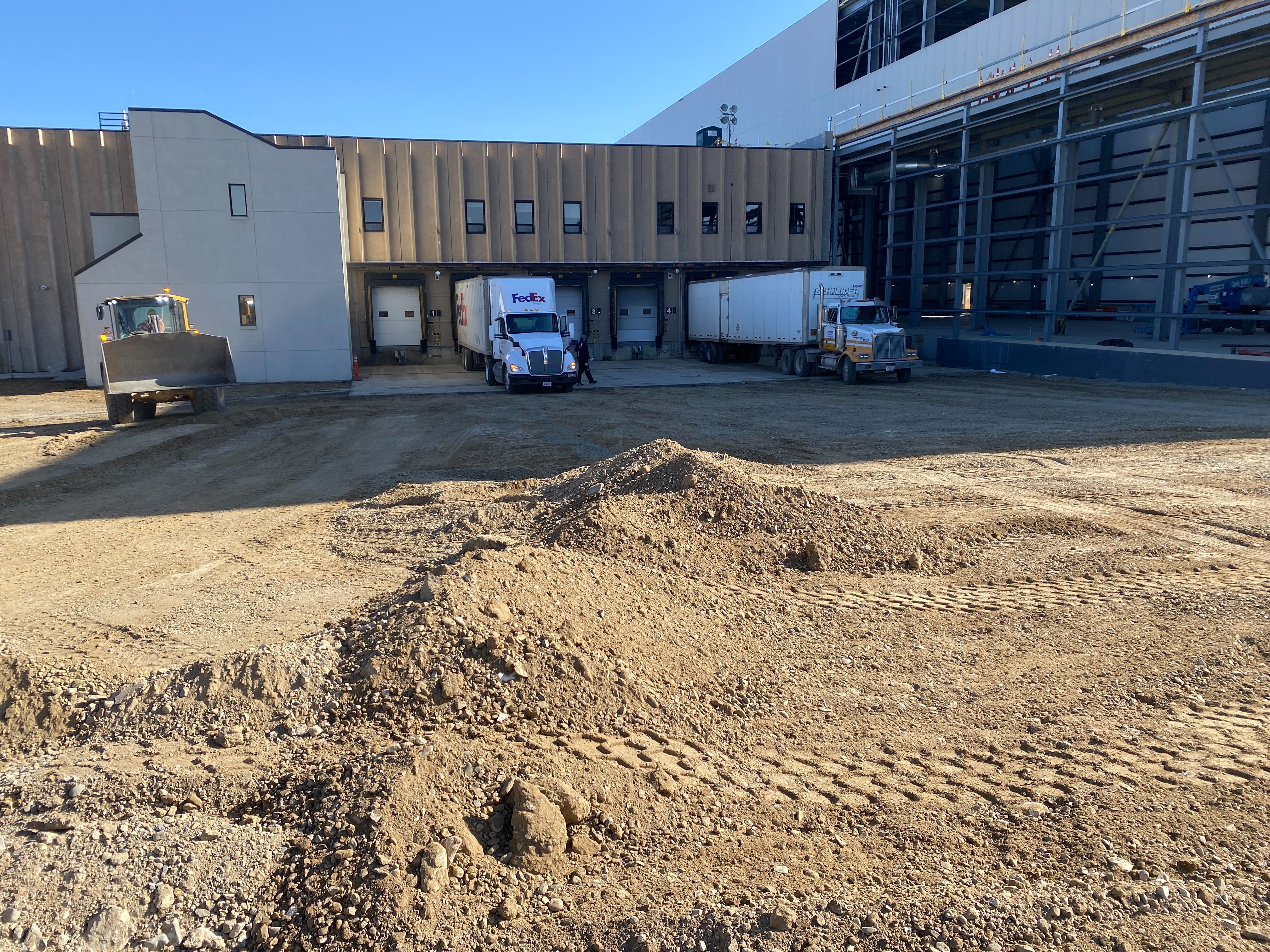 Groung being prepared at a loading dock area at the warehouse