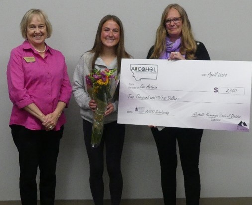 Zoe Axtman with Lt. Governor Kristan Juras and ABCD Administrator Becky Schlauch