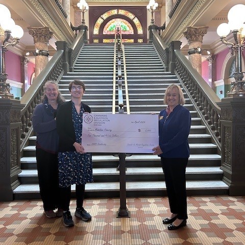 Madeline Pomeroy and Lt. Governor Kristen Juras at the scholarship ceremony at the Helena State Capitol.